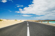 An asphalt road and dunes in Fuerteventura