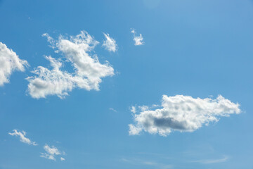 Wall Mural - bright blue sky with white clouds. natural background photo