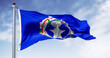 Flag of the Northern Mariana Islands waving in the wind on a clear day