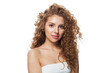 © artmim - Cute woman face. Young model with healthy skin, long hair and makeup on white background