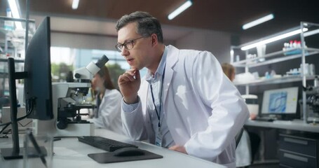 Aufkleber - Team of Diverse Male and Female Medical Research Scientists Work on a New Generation Medical Products in a Modern Laboratory. Focus on an Adult Scientist Working on Computer, Browsing Research Data
