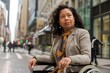 Confident Hispanic Businesswoman in Wheelchair on City Street