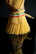 vertical Italian pasta noodles spaghetti on black background 