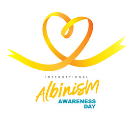 International Albinism Awareness Day. Yellow ribbon folded in the shape of a heart as a symbol of a rare genetic disease.