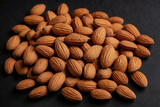 Fototapeta  - Almonds ai generated. Almond background. Almonds top view background. Generative AI