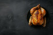 grilled chicken on a stone table, top view
