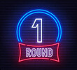 Round One neon sign on brick wall background.