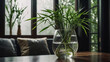 A bamboo plant, with its slender stalks and lush green foliage, thriving in a sleek glass vase filled with water.