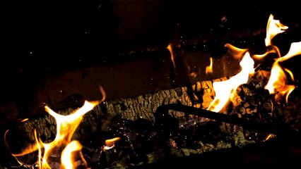 Wall Mural - Super slow motion fireplace burns with a bright flame of firewood. High quality FullHD footage