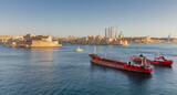 Fototapeta Boho - Several large red tankers on the roadstead of Valletta on a sunny morning.