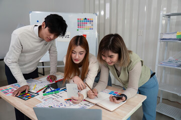 Wall Mural - brainstorm team of creative web graphic designer planning. creative designers present ux ui to team.