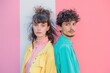 © MediaRaw - Two people are standing next to each other, one wearing a yellow jacket