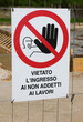 No trespassing sign in Italian language outside an construction site in Italy