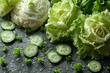 A variety of green vegetables including lettuce and cucumbers, looking fresh with water drops and adding to a healthy diet