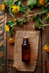 Wall Mural - elecampane essential oil in a bottle. Selective focus.