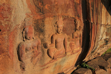 Wall Mural - Statuary at Pha Mo E Dang with sunrise in in Khao Pra Wihan National Park in Sisaket Province, Thailand