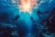 Scuba divers underwater experience a captivating exploration of a vibrant coral reef with sunlight filtering through