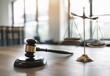 a gavel and scales of justice on a table