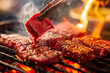 © mankjon - A close-up image of thick slices of marbled red meat being grilled over a flaming charcoal barbecue, tongs flipping one with visible grill marks