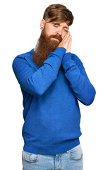 Wall Mural - Young irish redhead man wearing casual clothes sleeping tired dreaming and posing with hands together while smiling with closed eyes.