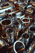 Detailed close up of a bunch of metal pipes. Suitable for industrial, construction, or plumbing concepts