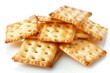 A pile of crackers on a white plate, perfect for food and snack concepts