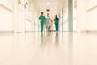 © ADDICTIVE STOCK - Medics and patient in hall