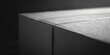 Minimalistic black and white photo of a table edge. Suitable for interior design projects