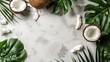 Fresh coconuts and leaves on a white surface, perfect for tropical themed designs