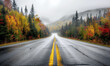 Scenic Road Through Autumn Colored Forest in Canadian Wilderness
