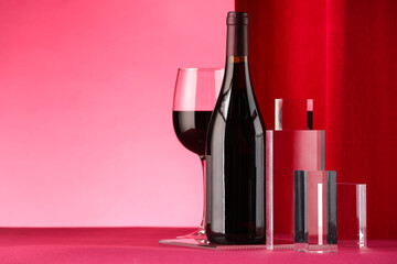 Sticker - Stylish presentation of delicious red wine in bottle and glass on color background. Space for text