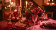 Festive table setting  with cutlery, candles and beautiful red flowers in vase