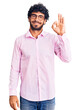 © Krakenimages.com - Handsome young man with curly hair and bear wearing business clothes smiling positive doing ok sign with hand and fingers. successful expression.