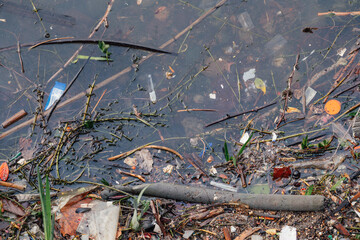 garbage and oil washing ashore