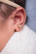 © natrocfort - Tiny newborn baby ear body part listen