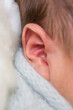 © natrocfort - Tiny newborn baby ear body part listen