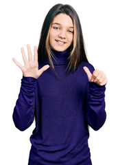 Wall Mural - Young brunette girl with long hair wearing turtleneck sweater showing and pointing up with fingers number six while smiling confident and happy.