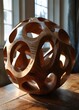 Wooden sculptures that turn out to be a fascinating amalgamation of organic forms and mathematical elements, blending the smoothness of curved lines with geometric precision.