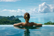 Woman savouring a peaceful moment by an infinity pool with a serene ocean view
