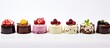 Different toppings adorn a row of delectable desserts in a close-up view, enticing the taste buds