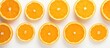 Fresh orange slices arranged closely together on a clean white background, highlighting their vibrant color and juicy texture