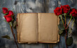 red roses laying next to an open vintage notebook with copy space.