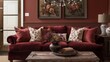 A cozy sitting area features a plush velvet sofa in a rich burgundy color accented with warm throw pillows. The walls are painted in a soft taupe creating a warm and inviting atmosphere. .