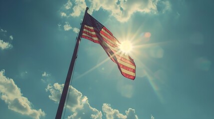 Generative AI : An american flag backlit by the sun against a blue sky with clouds