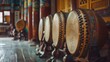 Many drums on wooden floor