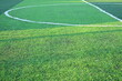 © sutichak - artificial green grass soccer field with white line