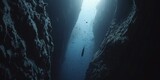 Fototapeta Londyn - A Lone diving Fish Silent Descent Between Towering Underwater Cliffs in the Oceans Mystifying Depths, Generative AI