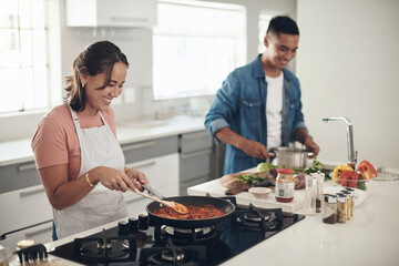 Canvas Print - Helping, cooking and couple in kitchen together with healthy food, relationship and bonding in home. Diet, happy man and woman in apartment with nutrition, care and diet meal prep with love for lunch