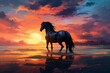 Black horse standing on top of a sandy beach under a cloudy blue and orange sky with a sunset.