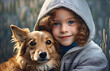 Portrait of a cute little redhead freckled girl wearing a hoodie and hugging his terrier dog.